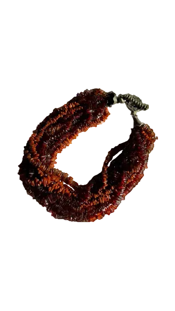 9 strand amber necklace with a brass clasp