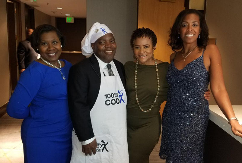photo of friends at 100 men who cook gala